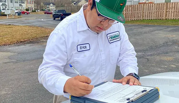 technician filling out report