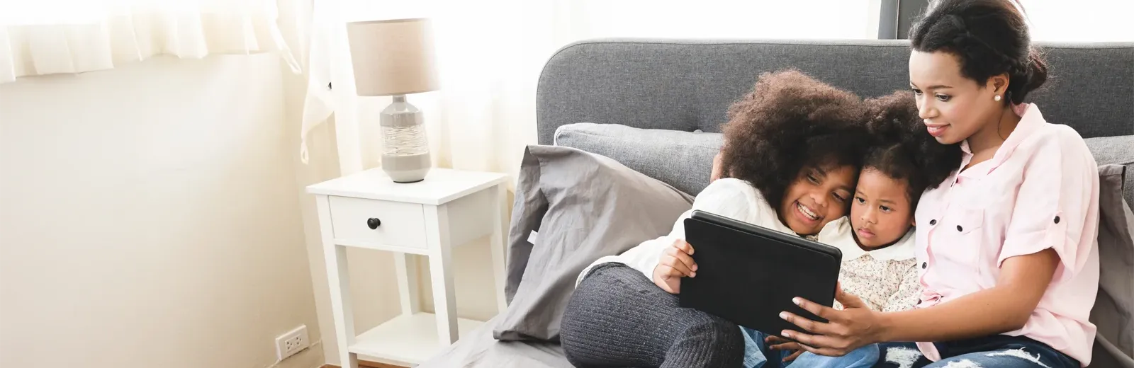family reading in pest free living room