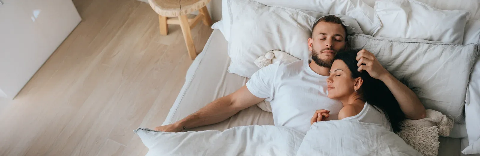 couple sleeping peacefully in bed bug free bed