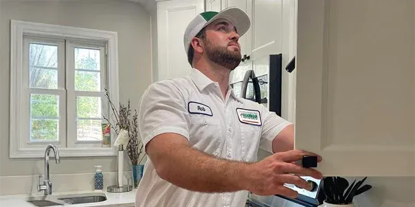 technician inspecting kitchen