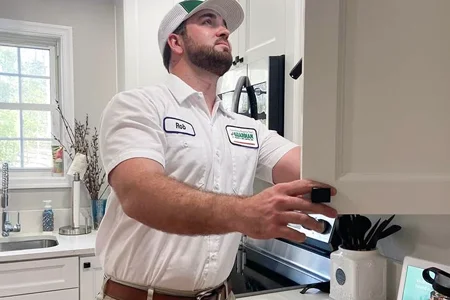 technician inspecting kitchen